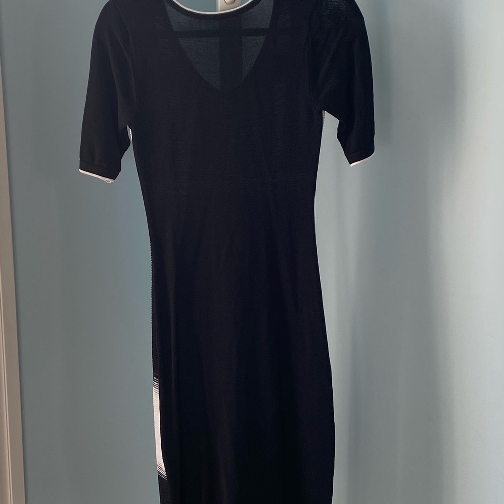 Semi formal, length is just below the knees.